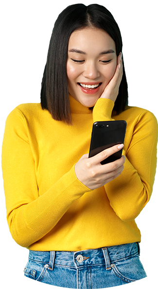 image of happy asian woman reading message on mobi FKGGSJ9 e1650561666821